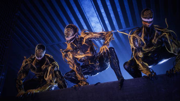 spider-man 2 trio of symbiotes together under a bridge.