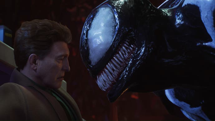 spider-man 2 venom is face to face with a scared norman osborne