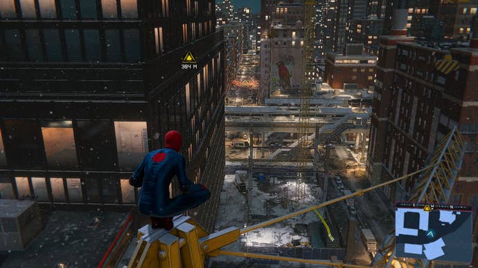 Miles Morales sits on a crane and looks out over a snowy New York in Marvel’s Spider-Man: Miles Morales