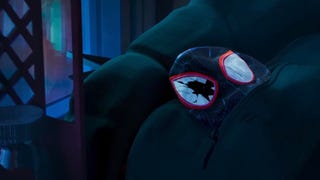 Miles Morales' Spider-Man mask peaking out of a jacket pocket, the right eye is smashed in The Spider Within: A Spider-Verse Story.