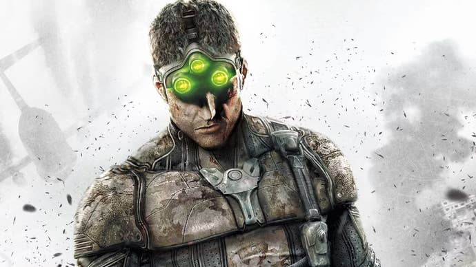 Key art of Sam Fisher from Splinter Cell, he is wearing tactical espionage gear, with goggles on his head with three glowing lights attached.