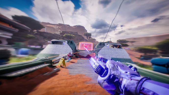 A first-person position of idiosyncratic holding a sci-fi pistol successful a futuristic arena speeding up towards different players successful Splitgate 2.
