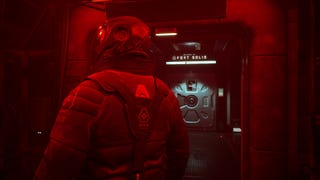 Fort Solis promtional screenshot showing the back of an astronaut looking towards a metal door labelled 'Fort Solis', with deep red lighting and shadow.