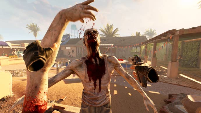 A screenshot from Arizona Sunshine 2 showing the player slapping a zombie around the face with a severed zombie arm.