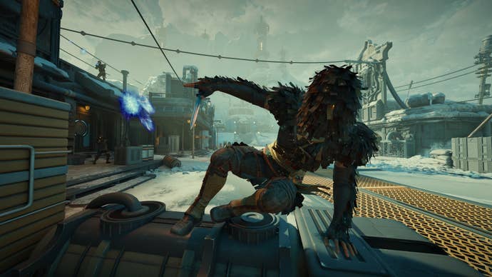 A character in a leafy ghilli suit leaps over a platform towards the camera while being shot at from afar.