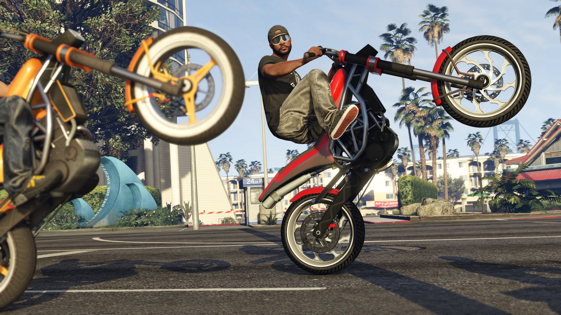 Two men do wheelies on motorbikes in GTA 5. - 23
