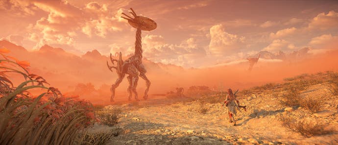 horizon forbidden west complete edition pc 21:9 aspect ratio screenshot showing aloy looking at a tallneck in the desert