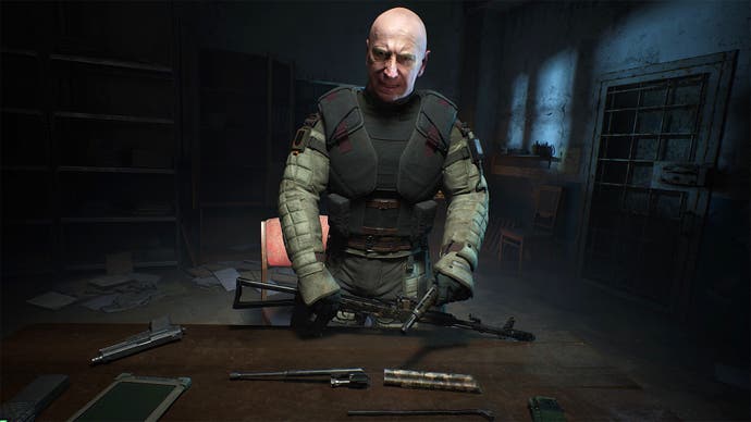 A man wearing a bulletproof vest assembles a rifle in Stalker 2: Heart of Chornobyl