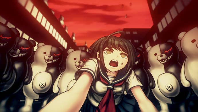 Komaru is surrounded by Monokumas in a city street with a red sky overhead.