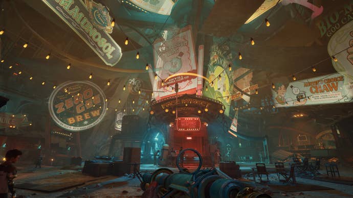 A neon-signed sci-fi city, showing a bright, many-coloured hub comprising shops and market stalls.