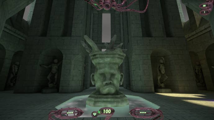 A brutalist, grey head statue in Straftat.