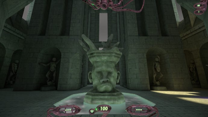 A brutalist, grey head statue in Straftat.