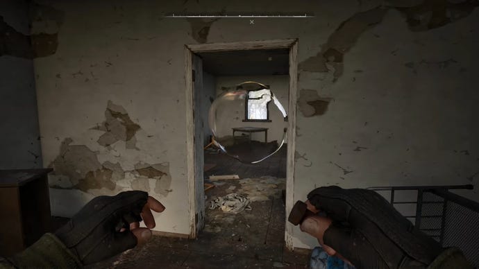The player in Stalker 2 stands in front of an anomaly in a doorway inside a house, and prepares to throw a Bolt into the anomaly to disable it.