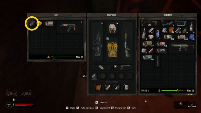 The player in Stalker 2 picks up a keycard from a dead body.