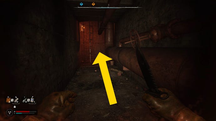 The player in Stalker 2 walks through a dark underground corridor towards a ladder.