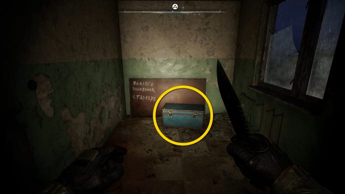 The player in Stalker 2 approaches a blue chest.