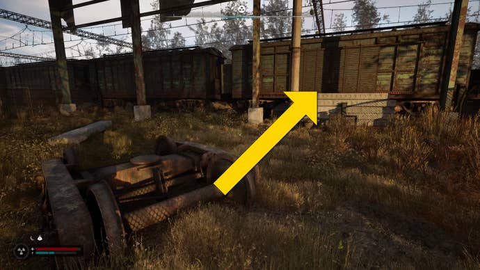 The player in Stalker 2 approaches a broken down train.