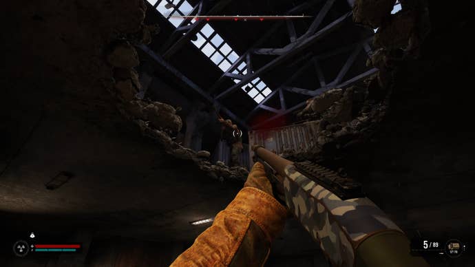 The player in Stalker 2 aims and shoots their shotgun up through a hole in the ceiling at an enemy.