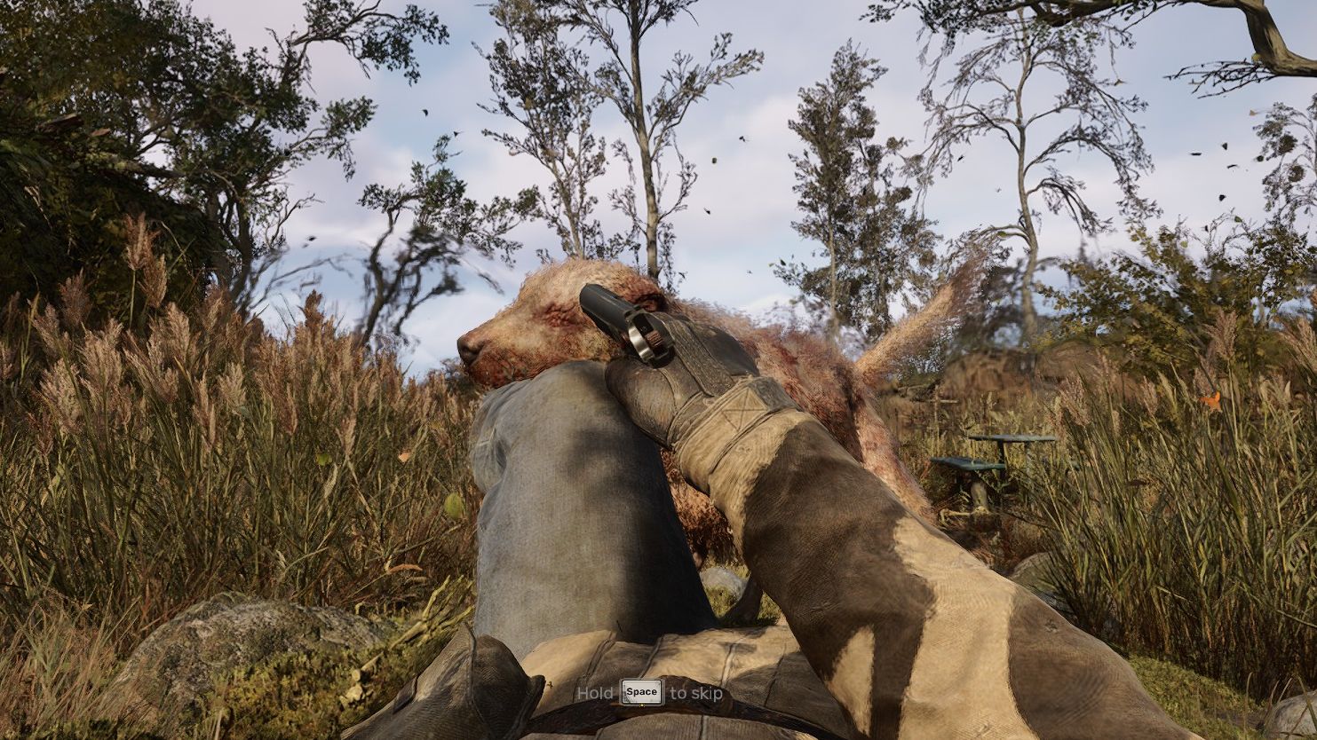 The player points his pistol at a mutant dog that is biting their leg. - 1