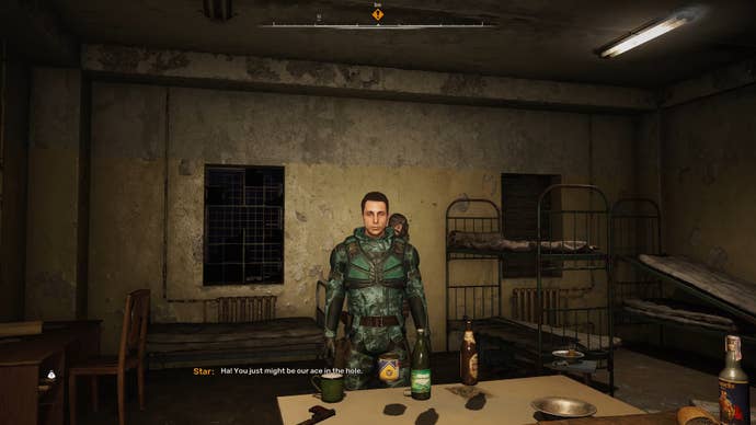 The player in Stalker 2 speaks to a man named Star behind a table indoors.