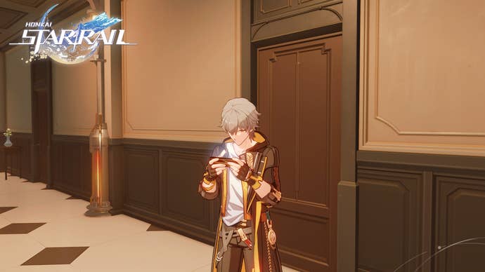 Honkai Star Rail Mr Cold Feet answers: An anime man with short silver hair, wearing a black blazer over a white shirt, is standing outside a hotel door. He looks at his phone as if trying to find an answer to a question
