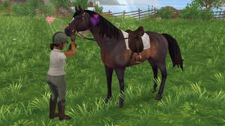 A character petting a horse in the online game Star Stable.