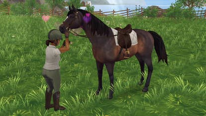 A character petting a horse in the online game Star Stable.