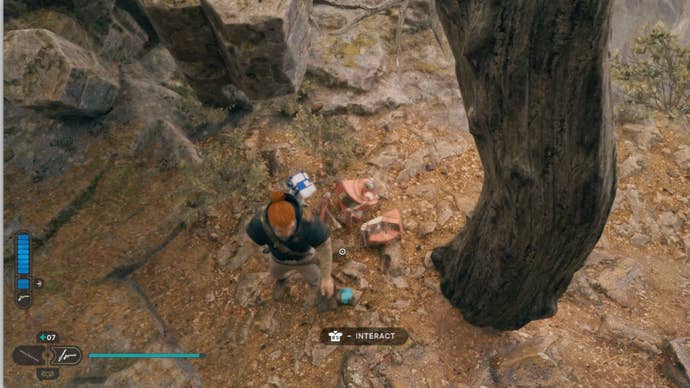 Cal Kestis stands over the bot he destroyed near the top of the Star Wars Jedi: Survivor Derelict Dam elevator.