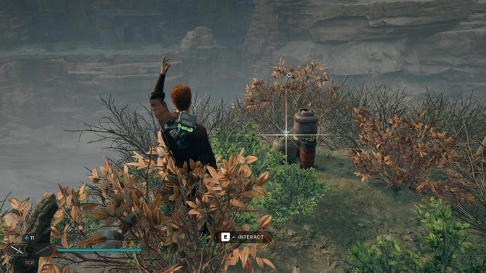 Cal approaches and picks up a collectible item on Koboh in Jedi: Survivor.