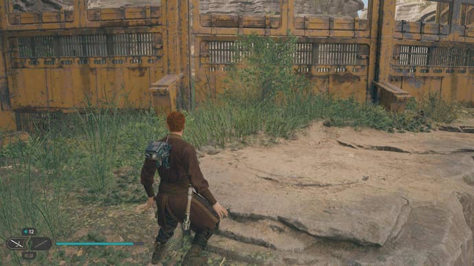 Cal walks towards a glowing plant in Fort Kah’lin in Jedi: Survivor.