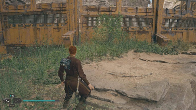 Cal walks towards a glowing plant in Fort Kah’lin in Jedi: Survivor.