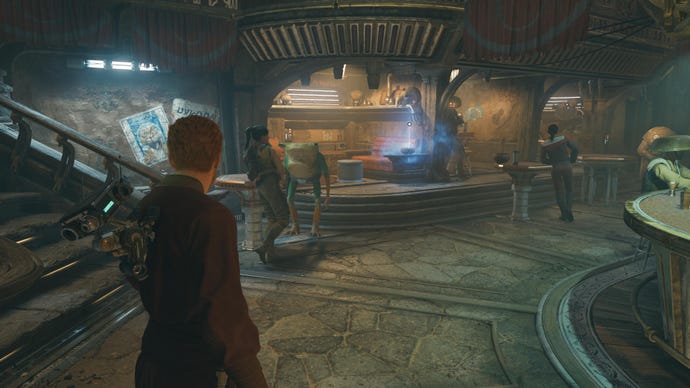 Cal walks towards a Force Echo in Pyloon’s Saloon in Jedi: Survivor.