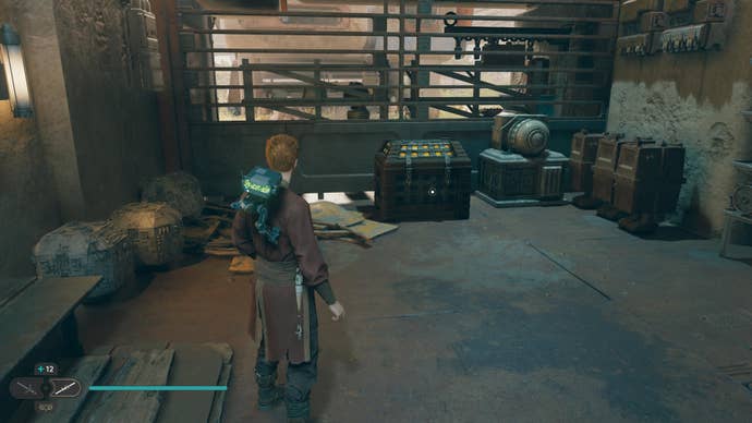 Cal approaches a large chest in Rambler’s Reach Outpost in Jedi: Survivor.