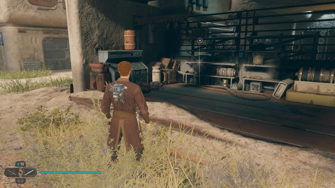 Cal approaches a datadisc inside a building on Koboh in Jedi: Survivor.