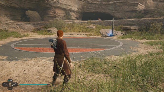 Cal stands in Rambler’s Reach Outpost in Jedi: Survivor and looks at a Force Echo in front of him.