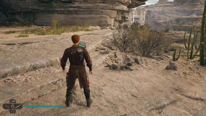 Cal looks at a glowing plant in Rambler’s Reach Outpost on Koboh in Jedi: Survivor.