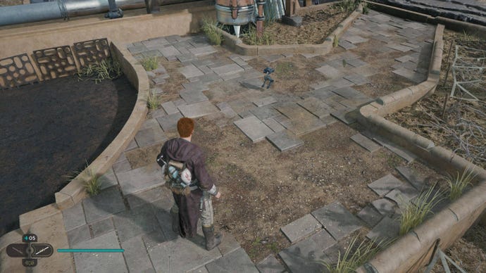 Cal looks towards a plant growing naturally in his garden atop Pyloon’s Saloon in Jedi: Survivor.