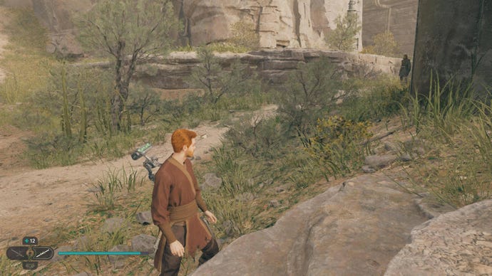 Cal approaches a plant collectible in Jedi: Survivor.