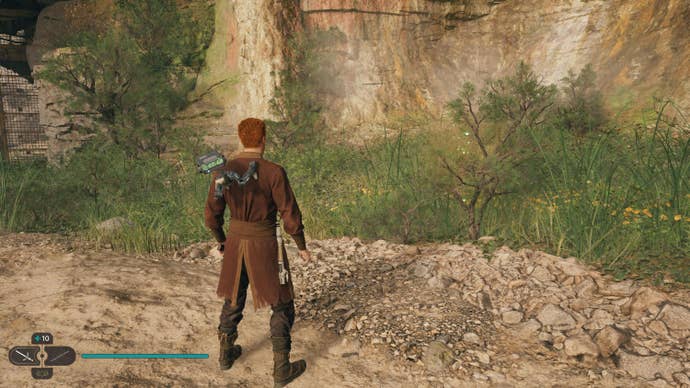 Cal approaches a glowing plant in Swindler’s Wash on Koboh in Jedi: Survivor.