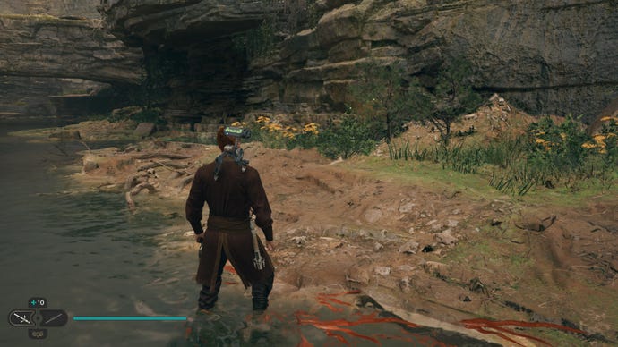 Cal approaches a glowing plant in Swindler’s Wash on Koboh in Jedi: Survivor.