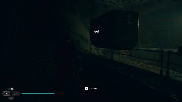 Cal prepares to scan a databank entry in the deep caverns of the Untamed Downs in Jedi: Survivor.