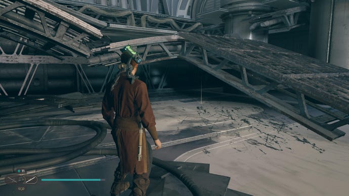 Cal approaches and picks up a collectible on Koboh in Jedi: Survivor.