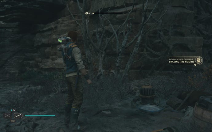 Cal approaches and picks up a collectible item on Koboh in Jedi: Survivor.