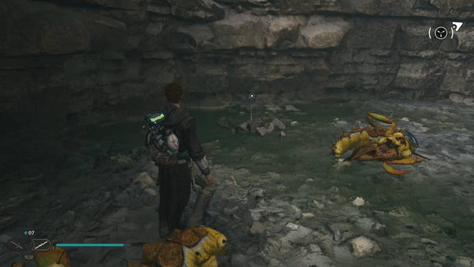 Cal approaches and picks up a collectible item on Koboh in Jedi: Survivor.