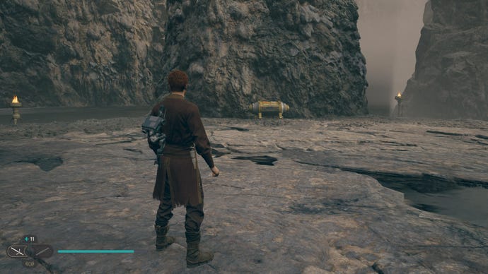 Cal approaches and picks up a collectible on Koboh in Jedi: Survivor.