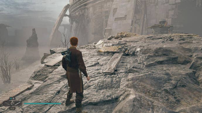 Cal approaches and picks up a collectible on Koboh in Jedi: Survivor.