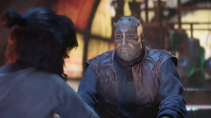 Star Wars Outlaws screenshot of ‘The Bartender’ Bram and Kay Vess at a cantina.