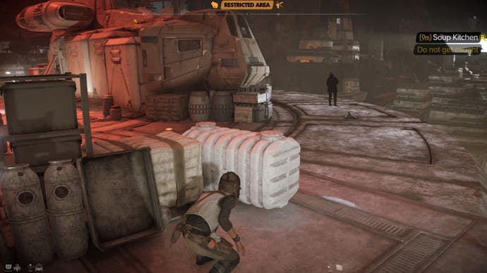 fake Star Wars Outlaws credits, path to Crimson Dawn soup kitchen, hiding behind a crate