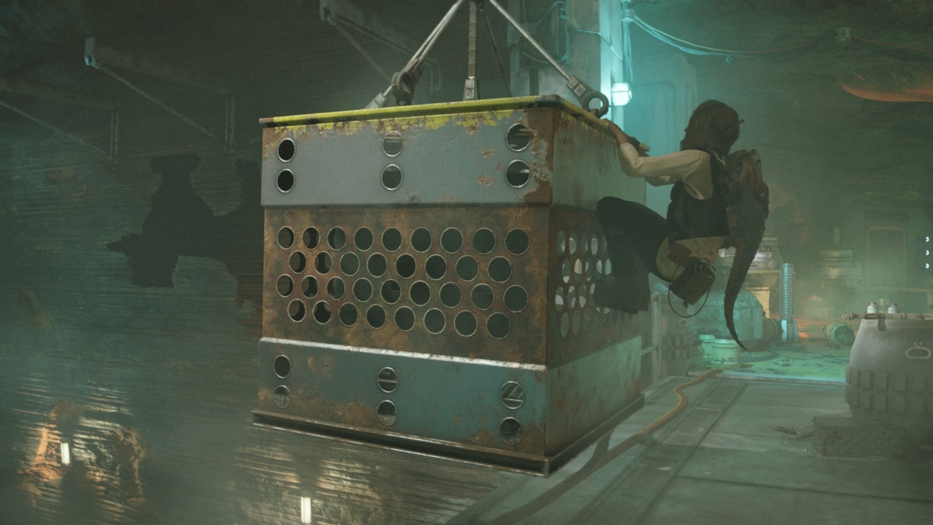 star wars outlaws kay holding onto moving crate in pyke workshop on toshara