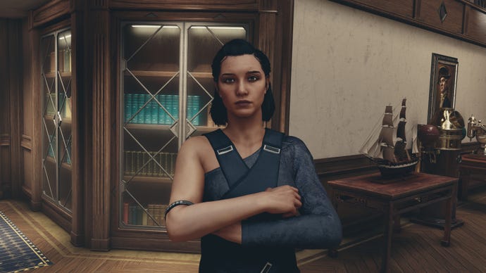 Andreja stands with her arms crossed looking at the camera in The Lodge in Starfield.